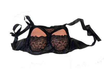 Costume Soft Foam bosom - breast form in a black lace bra.